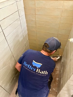 BetterBath employee tiling shower in Sisters OR