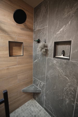 Close up of shelving details in custom tile shower by BetterBath