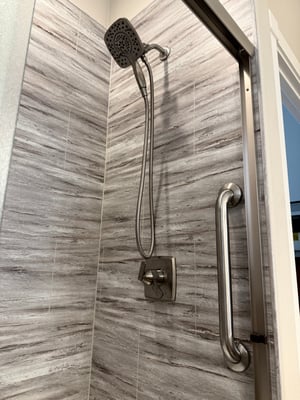 Close up of Nuvo Wall System with hand rail assistance done by BetterBath